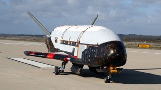 Unmanned U.S. space plane returns after secret, 2-year mission