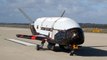 Unmanned U.S. space plane returns after secret, 2-year mission