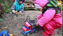 Toy construction trucks,  working in the sandbox, SDL (Lego) racers car.