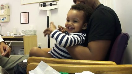 Baby laughing while getting shots