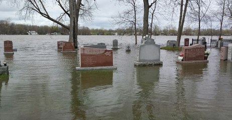 Church Graveyard Greeted by Rising Floodwaters Near Montreal