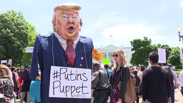 Protesters gather in front of White House after Comey fired