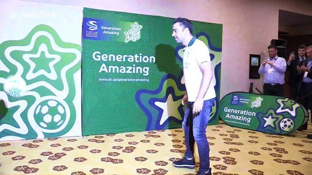 Former Barca midfielder Xavi shows off his skills in epic free-styling battle