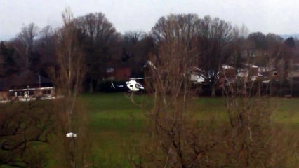 Air ambulance taking off from Three Bridges playing fields 11 April 2016