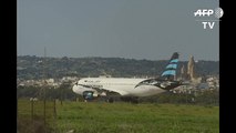 PHOTO_ Libyan plane hijacked, landsMalta_ PM