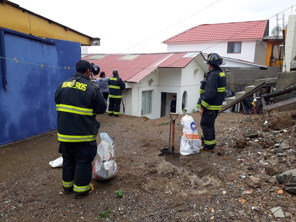 Rainwater Rushes Down Stairs During Flooding in Guanaqueros