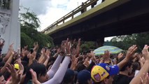 Demonstrators Pray for Protester Killed in Caracas Clashes