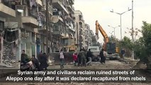 Syria army, civilians reclaim ruined Aleppo stree
