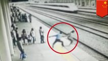 Chinese railway worker stops girl from committing suicide by train