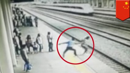 Chinese railway worker stops girl from committing suicide by train