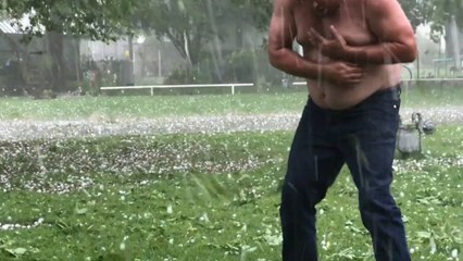 Crazy topless man braves Oklahoma hailstorm