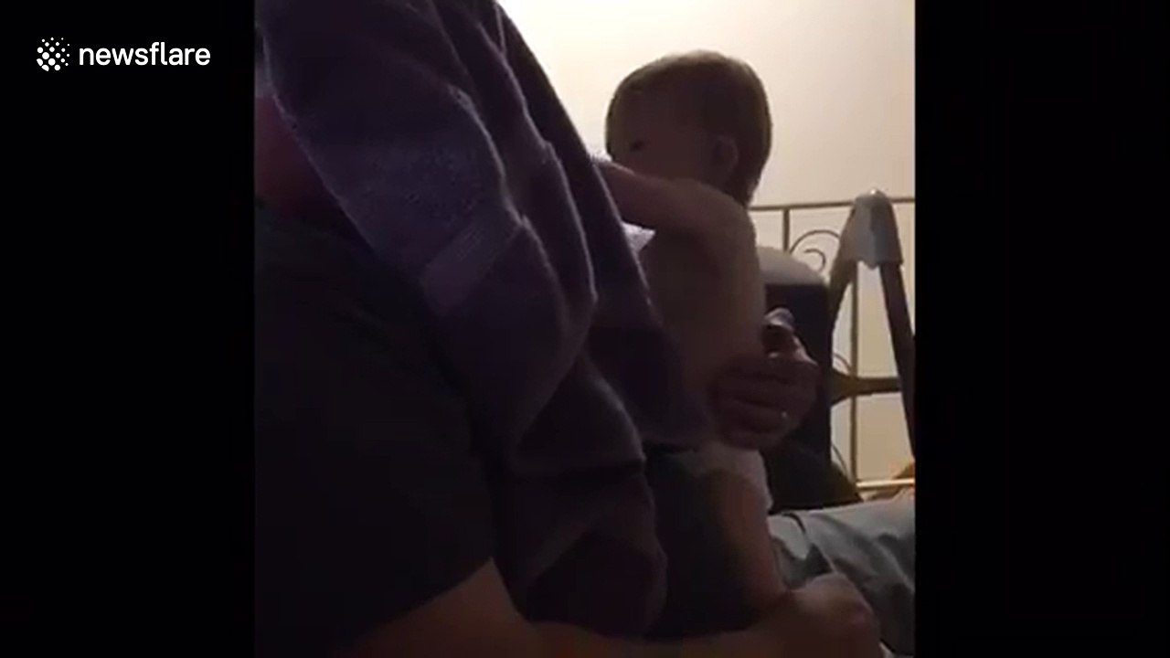 Baby's hilarious reaction to dad shaving beard