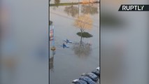 Quebec Residents Use Floods as Opportunity to Go Kayaking