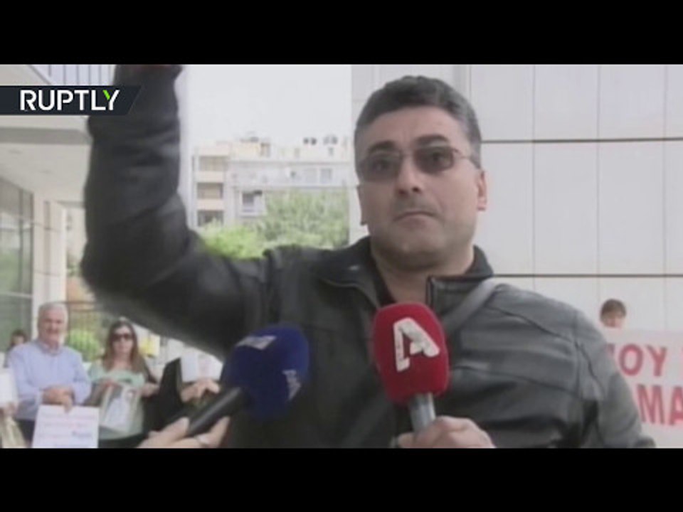 ‘Justice doesn’t exist’: Moment grieving uncle fires gun mid-interview in Athens