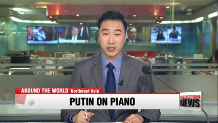 Putin plays piano as he awaits Chinese President Xi