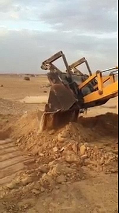 Diger in desert