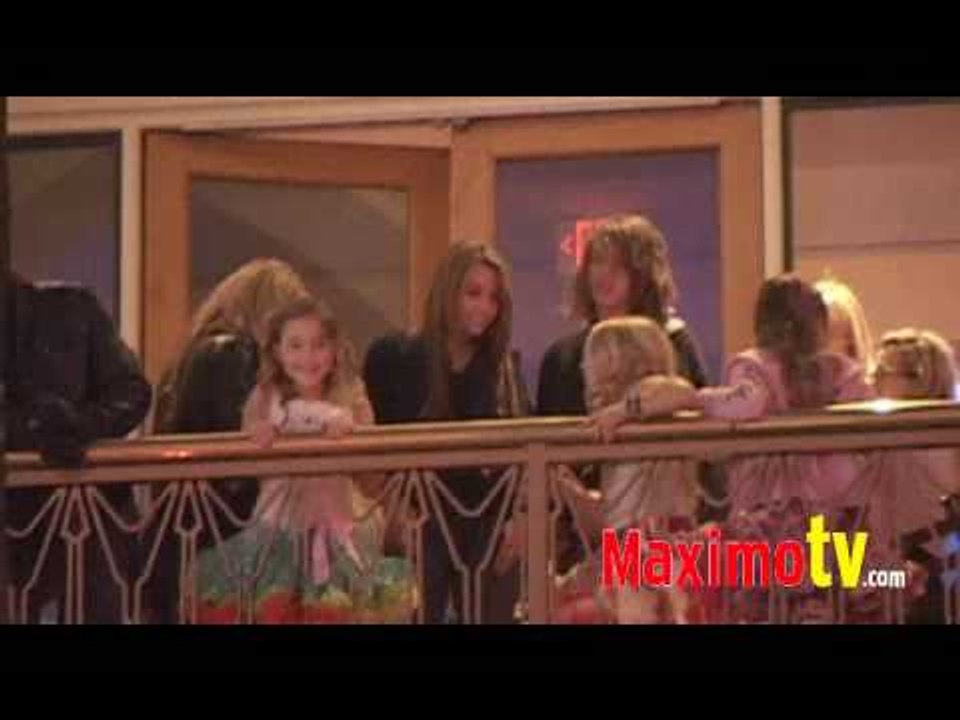 MILEY CYRUS and Family at HARD ROCK CAFE Universal City
