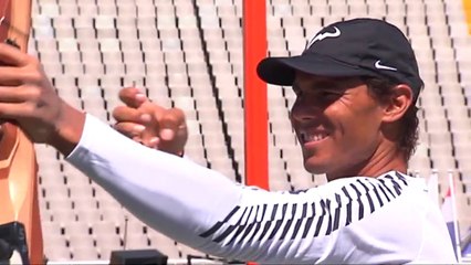 Rafael Nadal and Marc Lopez at the Olympic stadium in Barcelona, 24 April 2017