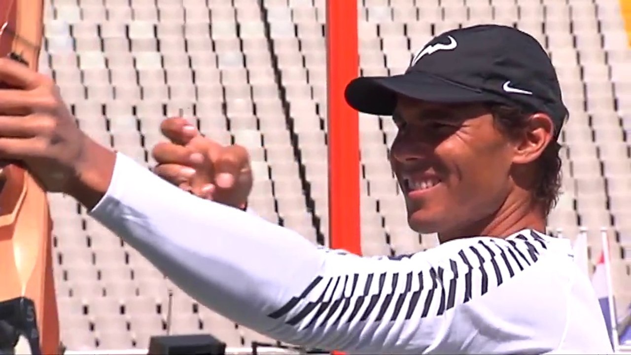 Rafael Nadal and Marc Lopez at the Olympic stadium in Barcelona, 24 April 2017