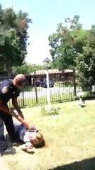 Mom attacked by cops in front of her children