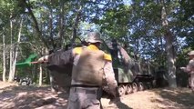 Marines Practice Beach Landing In Amphibious Assault Vehicles