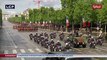Emmanuel Macron remonte les champs Elysées en voiture militaire