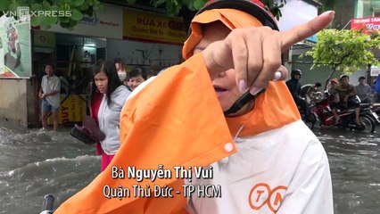 VnExpress | Thời sự | Nước cuồn cuộn trên đường sau cơn mưa lớn ở Sài Gòn