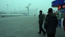 Beijing cloaked in  as schools, factories close[1]