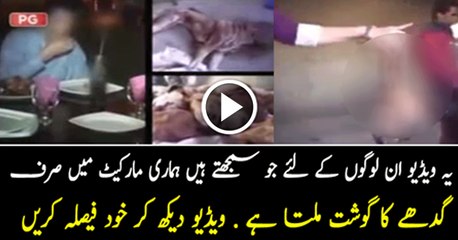 Pakistanis selling dog meat