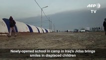 Newly-opened school at IDP camp in Iraq brings smiles in asd