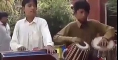 school boy singing dulhe ka sehra suhana lagta hai