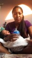 Nursing mother raps while taking care of her baby