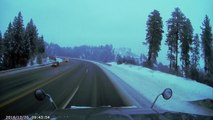SUV on Snowy Highway Collides Head On with Semi