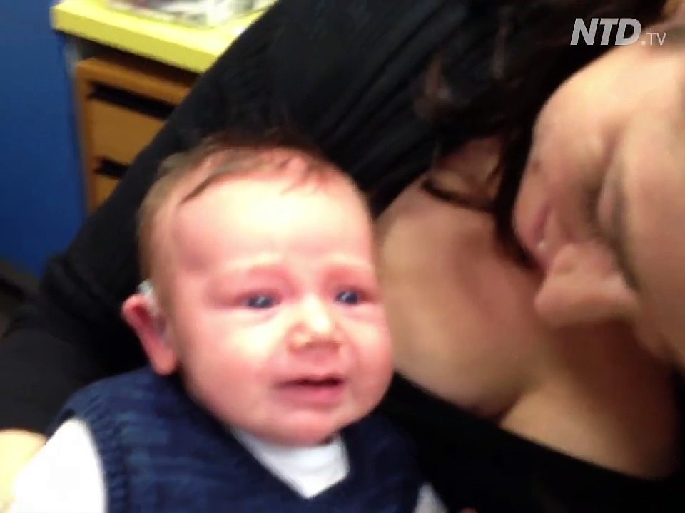 The baby first hears the sound