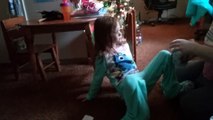 Girl opens her cotton candy Christmas present