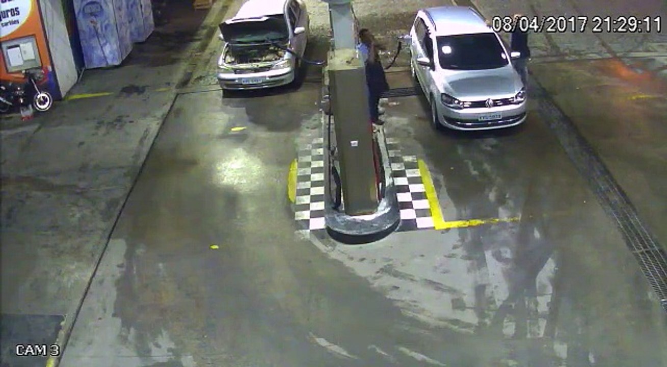 Warning - do not sit in the car while filling gas