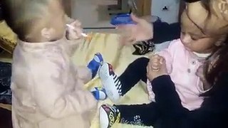 Twins Baby(Baby Boy And Baby Girl) Fighting for lollipop