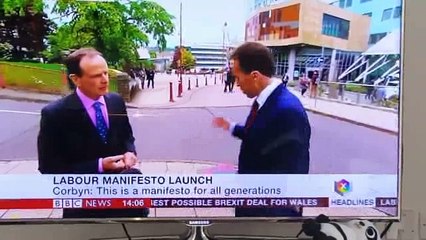 BBC reporter slapped on air for touching woman's breast