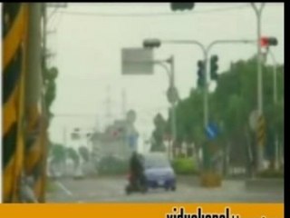 Biker gets hit by a car