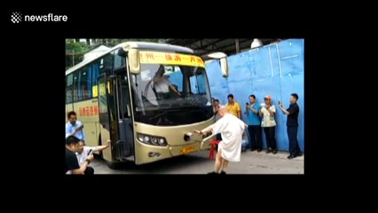 Chinese 'kung-fu master' pulls a coach with his private parts