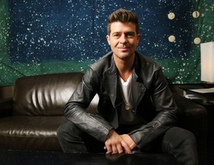 Robin Thicke takes legal action against dad's third wife over estate