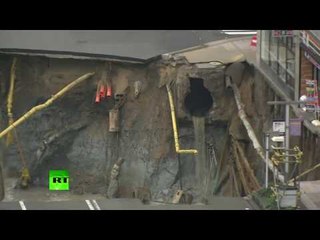 Hellish pit: Massive sinkhole opens on busy road near subway station in Japan