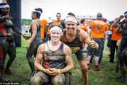 Determined father tries to help son in Tough Mudder event