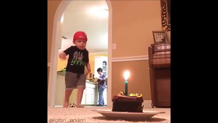 Ce gamin éteint la bougie de son gateau en tirant dans son ballon.. Fake or not?