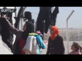 Iraqi women ditch burqas as they arrive at IDP camp after fleeing Mosul