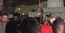 Confederate Flags Fly as Crowds Await Removal of Robert E Lee Statue