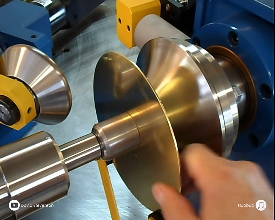 Spinning a Brass Lamp Top