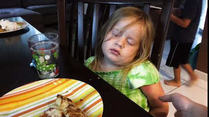 The Girl fall asleep when eating pizza