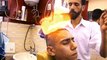 Drop the scissors because this barber is so lit, he cuts hair with fire