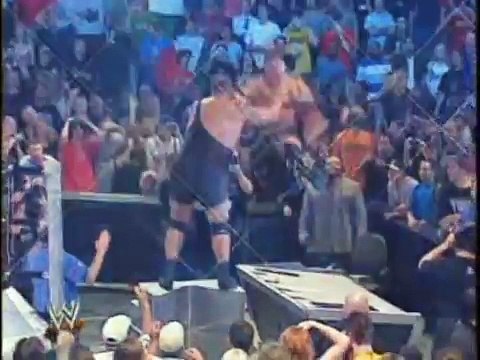 Big Show Chokeslams Brock Lesnar Through Announce Table